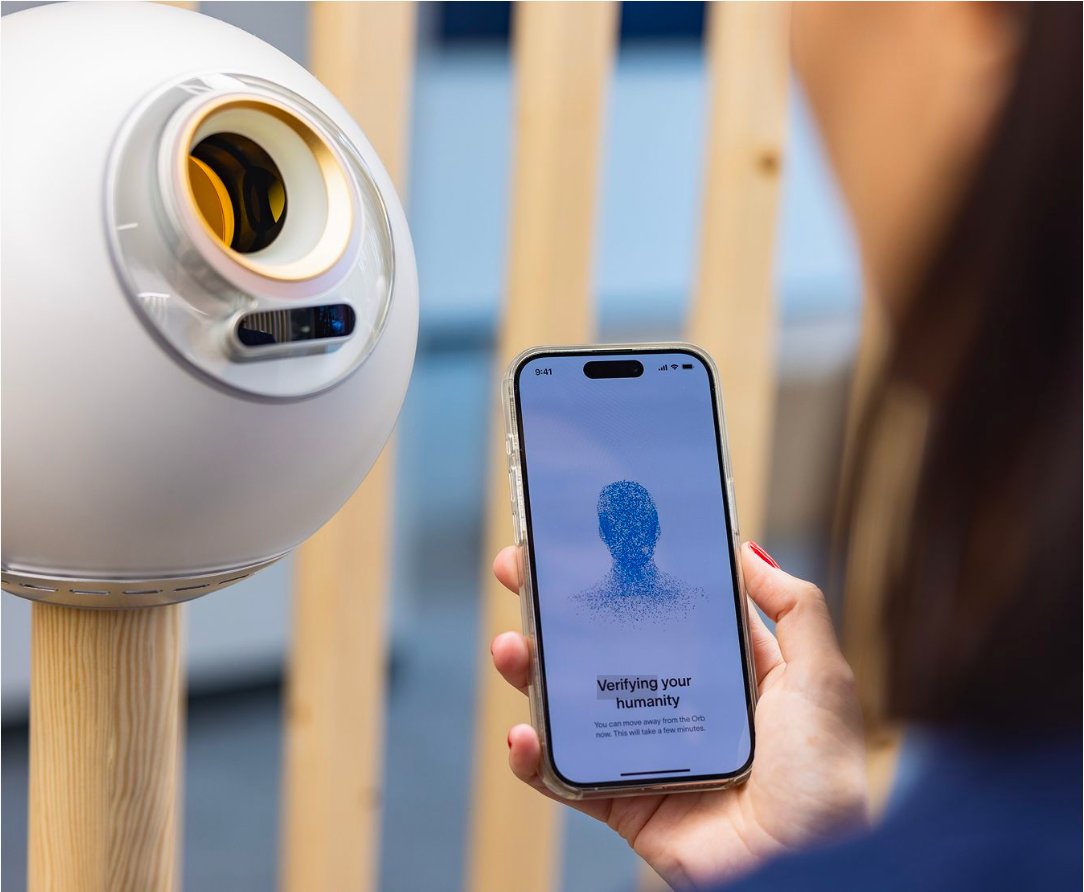 A customer verifying with the World ID Orb — phone shows 'Verifying your humanity' screen